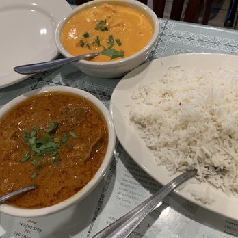 Star of India - a plate of rice, a bowl of curry, and a bowl of rice - Indian Near Me - Athens, Ohio Star of India - a plate of rice, a bowl of curry, and a bowl of rice - Indian Near Me - Athens, Ohio