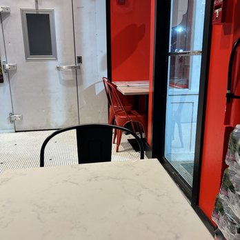 30 Burgers - Hoboken - a table and chairs - Burgers Near Me - Hoboken, New Jersey 30 Burgers - Hoboken - a table and chairs - Burgers Near Me - Hoboken, New Jersey