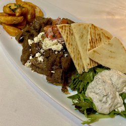 Mythos - Gyro Platter - Thin sliced gyro meat, tomato brunoise, feta cheese w/ tzatziki sauce, potato fries, pita bread
