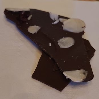 Innovo Kitchen - Tasty complimentary chocolate w/ almonds & cranberries. - American Near Me - Latham, New York Innovo Kitchen - Tasty complimentary chocolate w/ almonds & cranberries. - American Near Me - Latham, New York