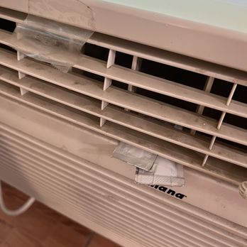 Safari Motor Inn - Nasty AC with ketchup packets stuffed inside. - Hotels Near Me - Joshua Tree, California