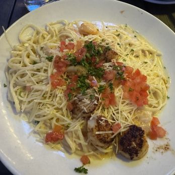 Harry's Seafood Bar & Grille - Shrimp scampi with added scallop - Seafood Near Me - St Augustine, Florida Harry's Seafood Bar & Grille - Shrimp scampi with added scallop - Seafood Near Me - St Augustine, Florida