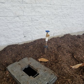 Saucedo Landscaping - a fire hydrant in the middle of a bed of mulch - Landscaping Near Me Saucedo Landscaping - a fire hydrant in the middle of a bed of mulch - Landscaping Near Me