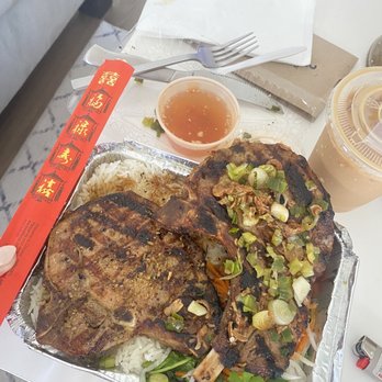 Saigon Bistro - Grilled Rice Platters - Pork Chops. Order came with 2 huge pork chops. Chopsticks as a reference for size. Worth it! - Vietnamese Near Me - Jersey City, New Jersey Saigon Bistro - Grilled Rice Platters - Pork Chops. Order came with 2 huge pork chops. Chopsticks as a reference for size. Worth it! - Vietnamese Near Me - Jersey City, New Jersey