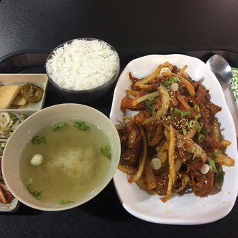 Sura Korean Bistro - Jeyuk Bokkeum (right) and banchan (left) - Korean Near Me - Duluth, Georgia Sura Korean Bistro - Jeyuk Bokkeum (right) and banchan (left) - Korean Near Me - Duluth, Georgia