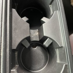 Monkey King Detailing - Trim piece missing from cup holder, there was a rubber insert here. And as shown, it's still dirty in the middle.