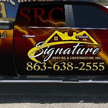Signature Roofing and Construction - a truck parked in front of a building - Roofing Near Me - Babson Park, Florida Signature Roofing and Construction - a truck parked in front of a building - Roofing Near Me - Babson Park, Florida