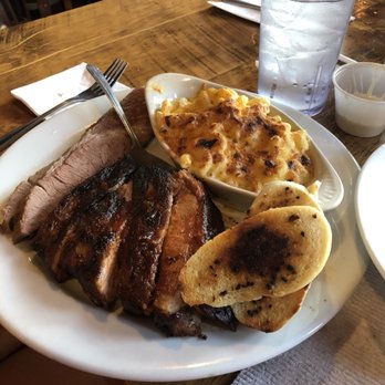 Griff's BBQ & Grill - Two meat plate (chose brisket and ribs) and comes with bread and two sides. My wife and I got Mac and cheese and a side salad. - American Near Me - Copperopolis, California