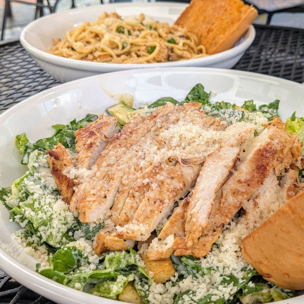 Cajun chicken linguine (back), chicken Caesar w avocado (front) Cajun chicken linguine (back), chicken Caesar w avocado (front)