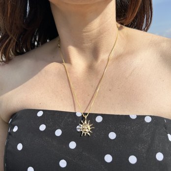 Bling Jewelry - Sun charm and gold necklace - Jewelry Near Me - Lancaster, California Bling Jewelry - Sun charm and gold necklace - Jewelry Near Me - Lancaster, California