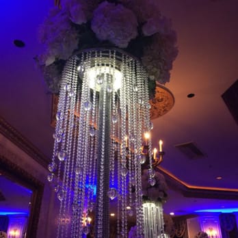 Elegant Flowers - Centerpieces on cascade chandelier - Florists Near Me - Forest Hills, New York Elegant Flowers - Centerpieces on cascade chandelier - Florists Near Me - Forest Hills, New York