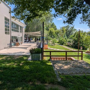 Seven Acre Dairy Company - The lawn between Seven Acre and the Sugar River - Hotels Near Me - Belleville, Wisconsin Seven Acre Dairy Company - The lawn between Seven Acre and the Sugar River - Hotels Near Me - Belleville, Wisconsin