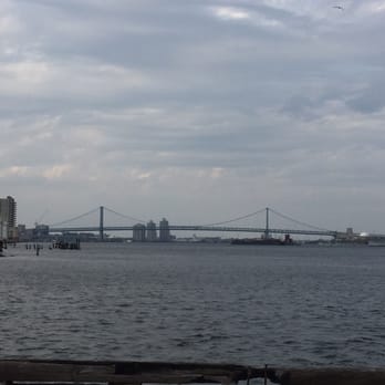 Delaware River Trail - a view of the delaware river with a bridge in the background - Arcades Near Me - Philadelphia, Pennsylvania Delaware River Trail - a view of the delaware river with a bridge in the background - Arcades Near Me - Philadelphia, Pennsylvania
