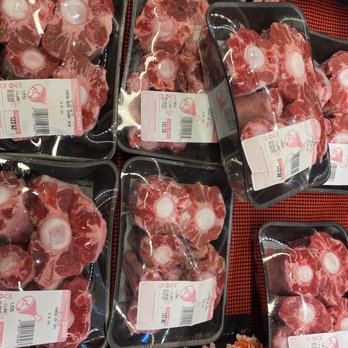 H Mart - a display of raw meat in plastic containers - International Grocery Near Me - Lakewood, Washington H Mart - a display of raw meat in plastic containers - International Grocery Near Me - Lakewood, Washington
