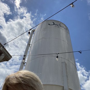 Jackie O's Taproom - a woman standing in front of a water tower - Breweries Near Me - Athens, Ohio Jackie O's Taproom - a woman standing in front of a water tower - Breweries Near Me - Athens, Ohio