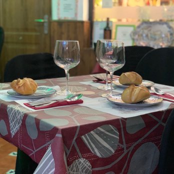 Lo Nuestro - Cosy table setup - Spanish Near Me - Toledo, TO
