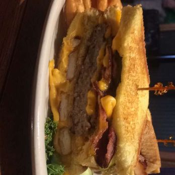 The Satellite Diner - THE BILLY BREEN $13.95 A burger patty, bacon, cheese, and fries with two grilled cheese sandwiches for a bun. - Breakfast & Brunch Near Me - Spokane, Washington The Satellite Diner - THE BILLY BREEN $13.95 A burger patty, bacon, cheese, and fries with two grilled cheese sandwiches for a bun. - Breakfast & Brunch Near Me - Spokane, Washington