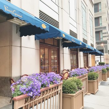 Pierrot Gourmet - outside tables surrounded by colorful flowers - Coffee & Tea Near Me - Chicago, Illinois Pierrot Gourmet - outside tables surrounded by colorful flowers - Coffee & Tea Near Me - Chicago, Illinois