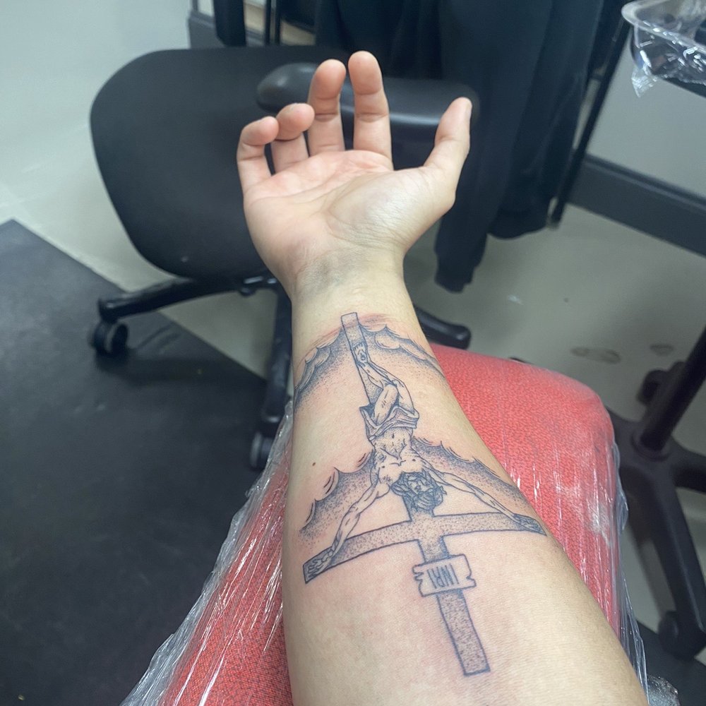 Jesus crucifix tattoo