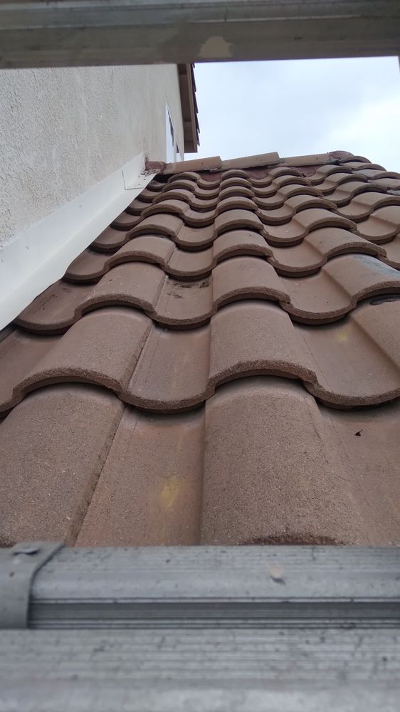 Slide of Monarch Roofing