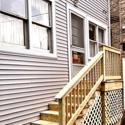 Siding, windows, & back porch.