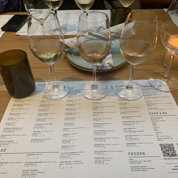 Sixty Vines - Wine flight in order from left to right: Riesling, Rosé (M Chapoutier), Moscato (Michele Chiarlo) - Wine Bars Near Me - Houston, Texas Sixty Vines - Wine flight in order from left to right: Riesling, Rosé (M Chapoutier), Moscato (Michele Chiarlo) - Wine Bars Near Me - Houston, Texas