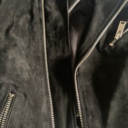 Capitol Hill Tailor - Re-hemmed and stitched panel on the left.