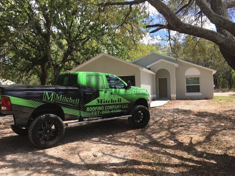 Slide of Mitchell Roofing Company