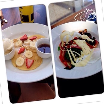 Jamaica Blue - Pancakes with banana and strawberry on the left. Eggs Benedict with an extra side of mushrooms on the right. - Coffee & Tea Near Me - Point Cook, VIC Jamaica Blue - Pancakes with banana and strawberry on the left. Eggs Benedict with an extra side of mushrooms on the right. - Coffee & Tea Near Me - Point Cook, VIC