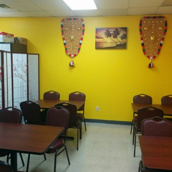 Triveni Indian Supermarket - dining area with tables and chairs - Patisserie/Cake Shop Near Me - Irving, Texas Triveni Indian Supermarket - dining area with tables and chairs - Patisserie/Cake Shop Near Me - Irving, Texas