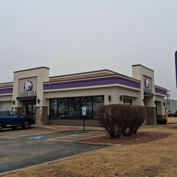 Taco Bell - Exterior shot of the Taco Bell on Larkin Ave in Joliet, as seen on a cloudy spring day - Fast Food Near Me - Joliet, Illinois