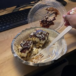 Frozen Over priced tiramisu, Different prices every time, the big, fat guy who makes the pizza, hates people.