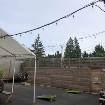 Space Room Lounge - Cornhole/bean bag toss area - Lounges Near Me - Portland, Oregon