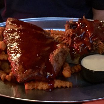 Hangar Pub & Grill - Ribs and pulled pork. Next time my husband will order the sauce on the side. Picky. - Pubs Near Me - Amherst, Massachusetts