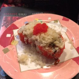 A crab California roll from the conveyor belt A crab California roll from the conveyor belt