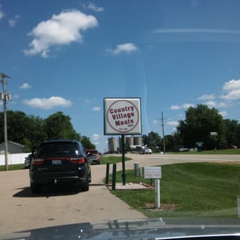 Country Village Meats - a car parked in front of a sign - Meat Shops Near Me - Sublette, Illinois