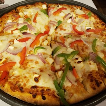 Malgudi Garden - Paneer tikka masala pizza - Indian Near Me - Plano, Texas Malgudi Garden - Paneer tikka masala pizza - Indian Near Me - Plano, Texas