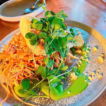 Great Room - a plate of food on a table - Wine Bars Near Me - Tofino, British Columbia Great Room - a plate of food on a table - Wine Bars Near Me - Tofino, British Columbia