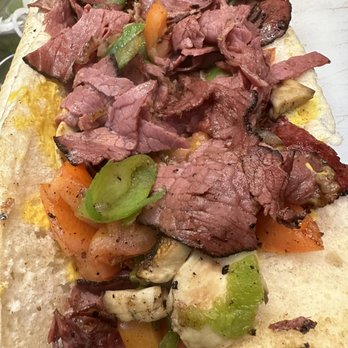Jon Smith Subs - This was a Pastrami Bomb I had. Also had amazing flavor and was very filling. - Sandwiches Near Me - Harrogate, Tennessee Jon Smith Subs - This was a Pastrami Bomb I had. Also had amazing flavor and was very filling. - Sandwiches Near Me - Harrogate, Tennessee