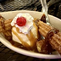 Churros with ice cream and dulce de leche- warm churros are so comforting! Churros with ice cream and dulce de leche- warm churros are so comforting!
