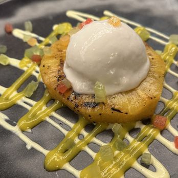 Sage & Salt Bistro - Pineapple dessert with coconuts, cream, sorbet, and mango cream - New American Near Me - Winston-Salem, North Carolina
