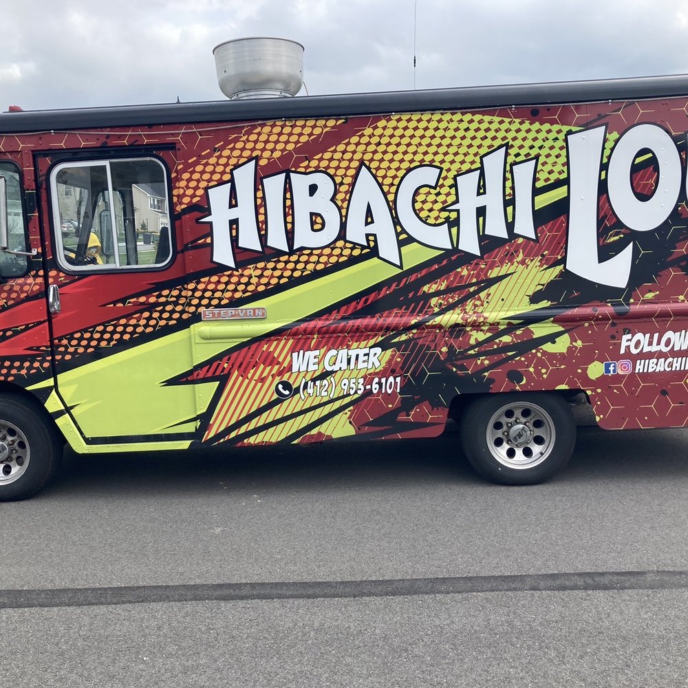 Hibachi Lou - a food truck parked in a parking lot - Food Trucks Near Me