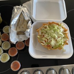Pastor Taco Salad and a Asada Burrito with lots of house made hot sauce!!! Pastor Taco Salad and a Asada Burrito with lots of house made hot sauce!!!