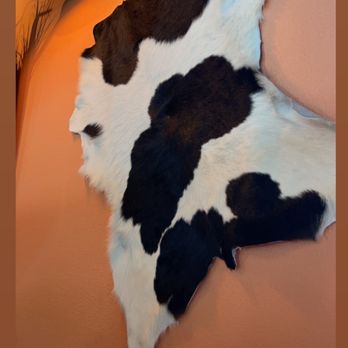 Kearney's Feed Yard - a cow skin on the wall - Bars Near Me - Sunnyvale, Texas Kearney's Feed Yard - a cow skin on the wall - Bars Near Me - Sunnyvale, Texas