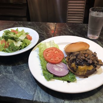 Mo's Grill - Belly Buster Burger with a side salad - Burgers Near Me - San Francisco, California Mo's Grill - Belly Buster Burger with a side salad - Burgers Near Me - San Francisco, California