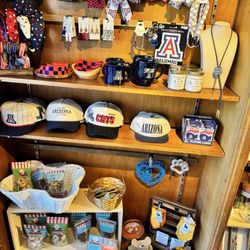 Sonoran House - Pup stuff, U of A pride section, and girl bling