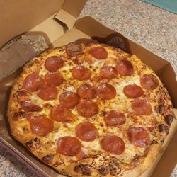 Domino's Pizza - Yummy cold, uncut pizza.