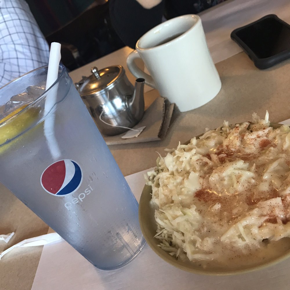 a plate of food and a drink a plate of food and a drink