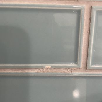 Arkansas Construction And Remodeling - worker constantly damaged these tiles with a utility knife, I finally hid his knife. - Roofing Near Me