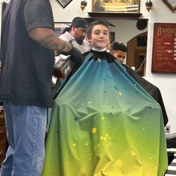 Custom Cuts Barber Shop - He was so excited about his haircut!
